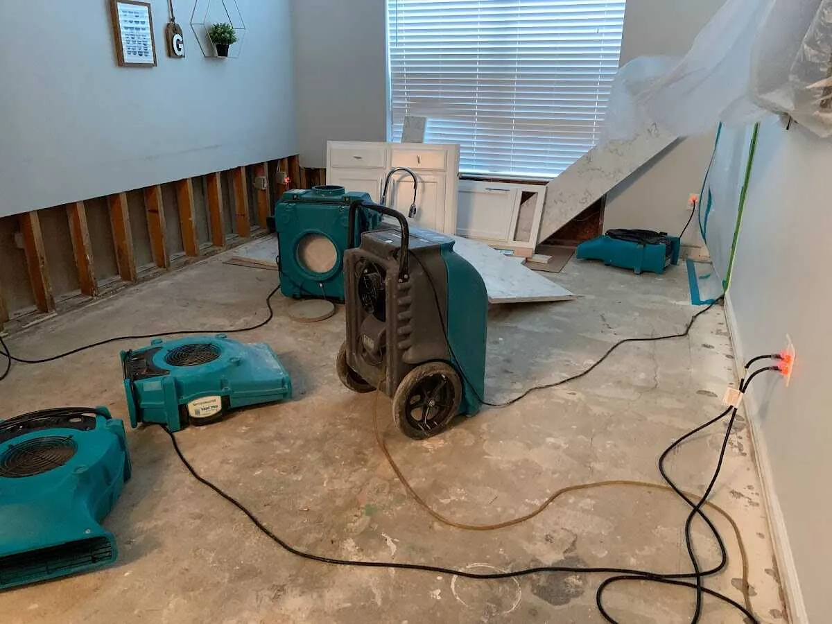 Dehumidifier in flood-cut room for Water Damage Restoration in Globe